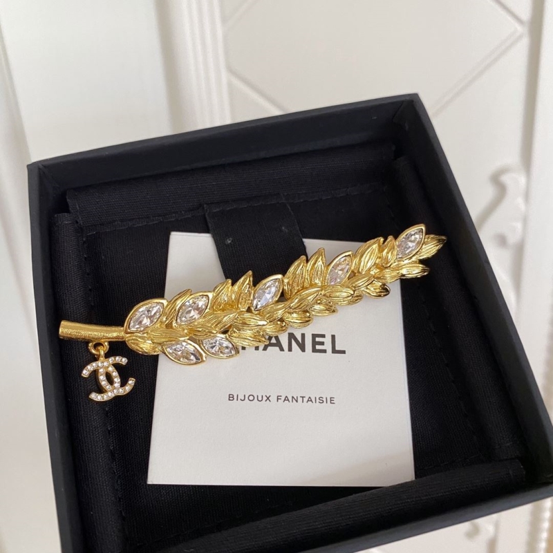 Ch*el brooches